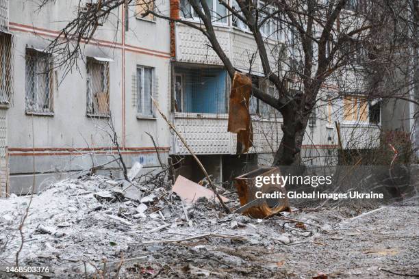 Rusty washing machine lies among the rubble in front of a building in Northern Saltivka on January 29, 2023 in Kharkiv, Ukraine. A building was...