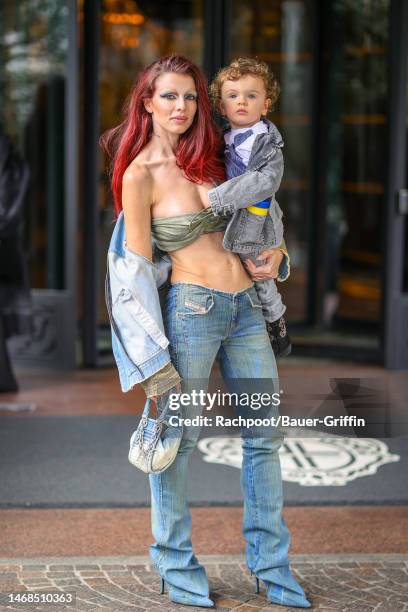 Julia Fox with her son Valentino are seen arriving to The Diesel show during the first day of shows at Milan Fashion Week on February 22, 2023 in...