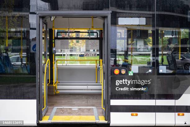 open door in bus - bus-door stock pictures, royalty-free photos & images