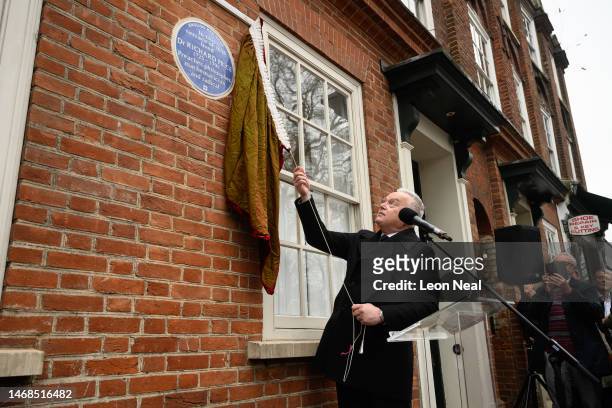 Broadcaster Huw Edwards unveils a blue plaque for 18th-century polymath Richard Price on February 22, 2023 in London, England. Price was born in...