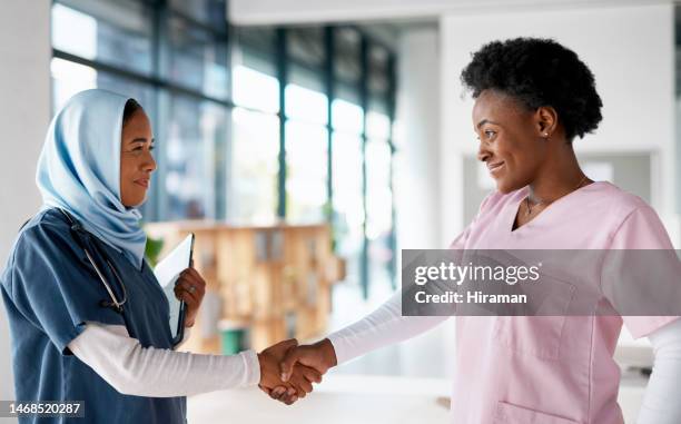 healthcare, onboarding and handshake, nurses in hospital with thank you and welcome, smile and doctor hiring. medicine, human resources and women shaking hands in clinic with medical collaboration. - nurse recruitment stock pictures, royalty-free photos & images