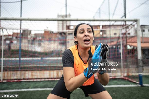 anger goalie talking to the team in the goal - fault sports stock pictures, royalty-free photos & images