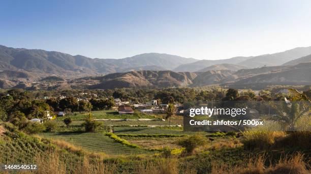 scenic view of agricultural field against clear sky,sacapulas,guatemala - guatemala landscape stock pictures, royalty-free photos & images