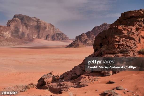 scenic view of desert against sky - midsection stock pictures, royalty-free photos & images