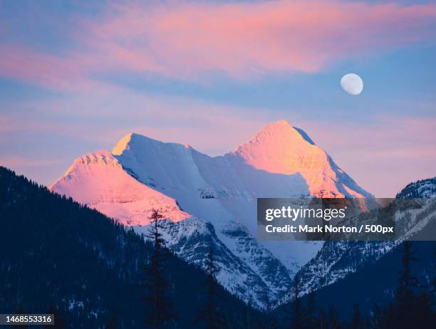 scenic view of snowcapped mountains against sky during sunset,helena,montana,united states,usa - helena montana ストックフォトと画像