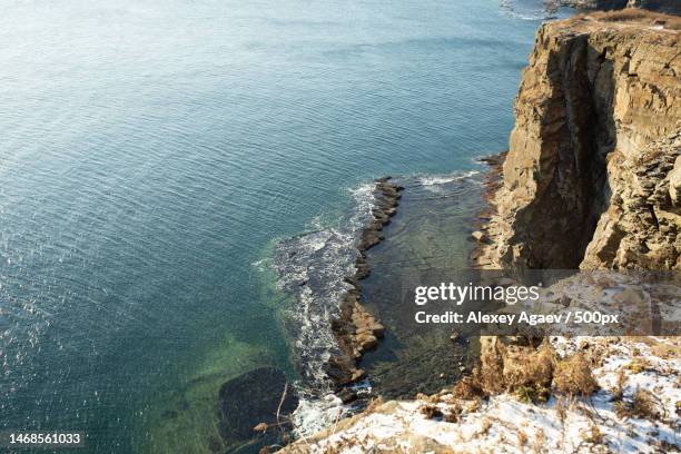 high angle view of rocks on beach,vladivostok,primorsky krai,russia - russian far east stock-fotos und bilder