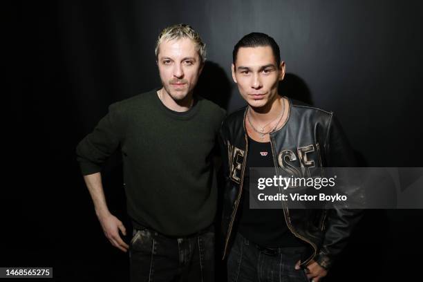 Glenn Martens and Evan Mock are seen at the Diesel Fashion Show during Milan Fashion Week Womenswear Fall/Winter 2023/24 on February 22, 2023 in...