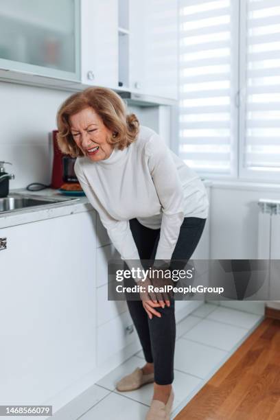 if i were young, i wouldn't lack anything - standing with hands on knees imagens e fotografias de stock