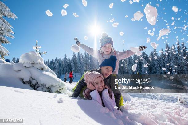 pyramid of children - funny snow skiing stock pictures, royalty-free photos & images