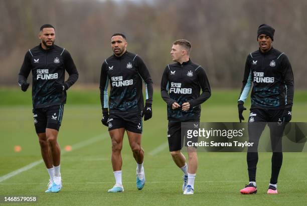Players seen L-R Jamaal Lascelles, Callum Wilson, Kieran Trippier and Joe Willock walk on the pitch wearing new training kit for the final during the...