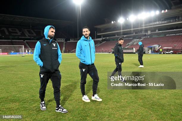 Elsedi Hysaj and Luis Alberto of SS Lazio look during the walk arau ahead of their UEFA Europa Conference League knockout round play-off leg one...