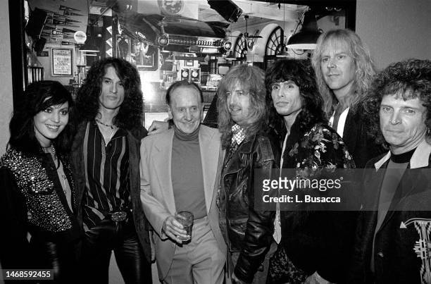 American rock band Aerosmith host a party for Les Paul celebrating his 75th birthday on June 12, 1990 at The Hard Rock Cafe in New York City, New...