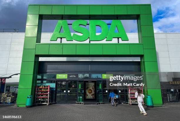 The Asda logo is displayed above a branch of the supermarket retailer Asda on February 19, 2023 in Bristol, England. A number of UK largest...