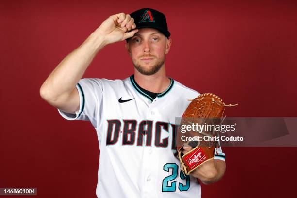 Merrill Kelly of the Arizona Diamondbacks poses for a portrait during photo day at Salt River Fields at Talking Stick on February 22, 2023 in...
