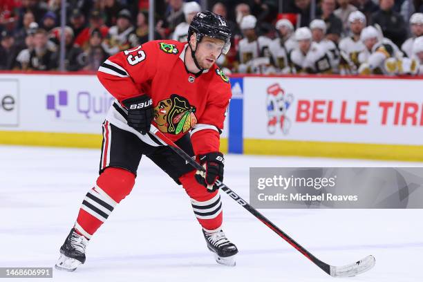 Max Domi of the Chicago Blackhawks skates with the puck against the Vegas Golden Knights during the third period at United Center on February 21,...