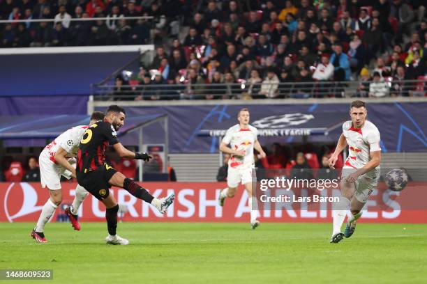 Riyad Mahrez of Manchester City scores the team's first goal during the UEFA Champions League round of 16 leg one match between RB Leipzig and...