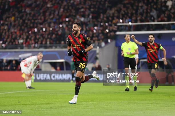 Riyad Mahrez of Manchester City celebrates after scoring the team's first goal during the UEFA Champions League round of 16 leg one match between RB...