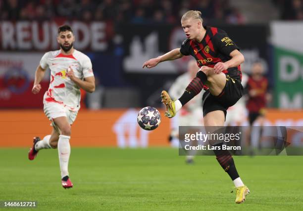 Erling Haaland of Manchester City controls the ball during the UEFA Champions League round of 16 leg one match between RB Leipzig and Manchester City...