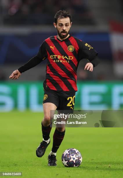 Bernardo Silva of Manchester City runs with the ball during the UEFA Champions League round of 16 leg one match between RB Leipzig and Manchester...