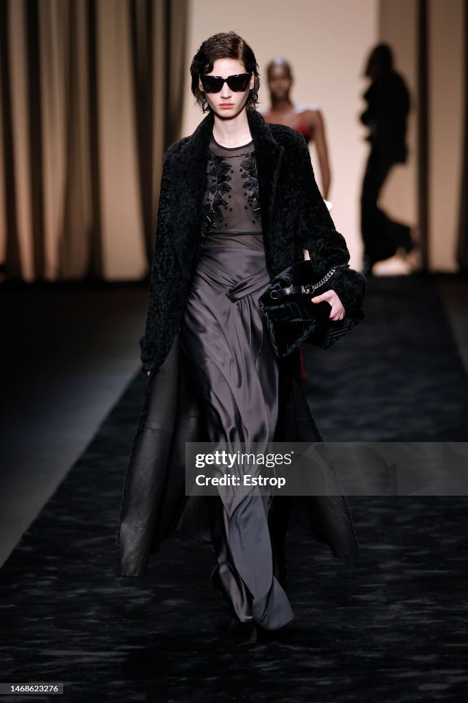 a-model-walks-the-runway-at-the-alberta-ferretti-fashion-show-during-the-milan-fashion-week.jpg
