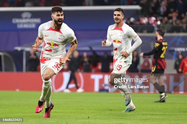 Josko Gvardiol of RB Leipzig celebrates after scoring the team's first goal during the UEFA Champions League round of 16 leg one match between RB...