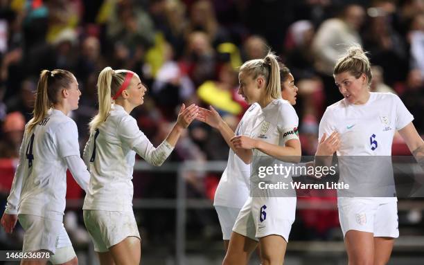 Chloe Kelly and Leah Williamson of England celebrate after an own goal by Julie Biesmans of Belgium, England's fourth goal during the Arnold Clark...