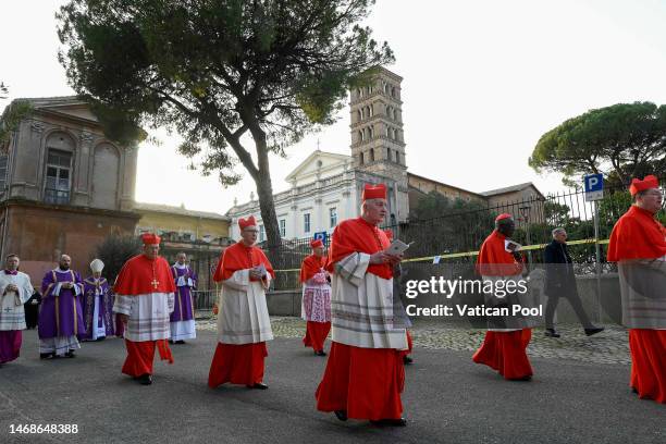 Cardinals walk in the procession before an Ash Wednesday Mass at the Santa Sabina Basilica on February 22, 2023 in Vatican City, Vatican. The rite of...