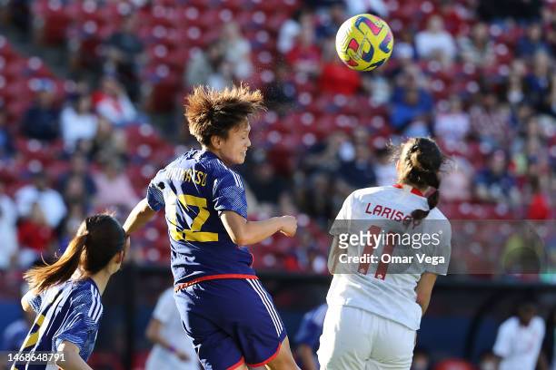Ruka Norimatsu of Japan jumps for a header over Clarissa Larisey of Canada during a 2023 SheBelieves Cup match between Canada and Japan at Toyota...
