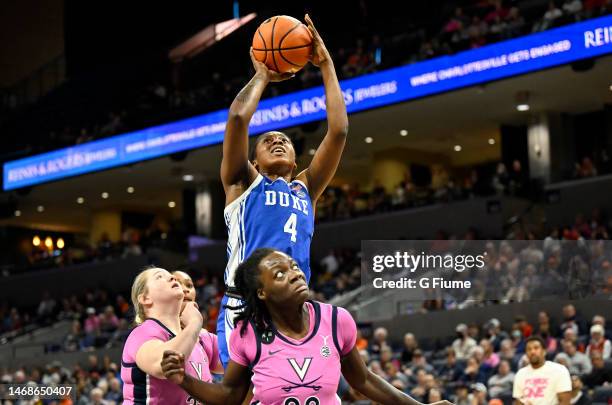 Elizabeth Balogun of the Duke Blue Devils shoots the ball against Alexia Smith of the Virginia Cavaliers at John Paul Jones Arena on February 19,...