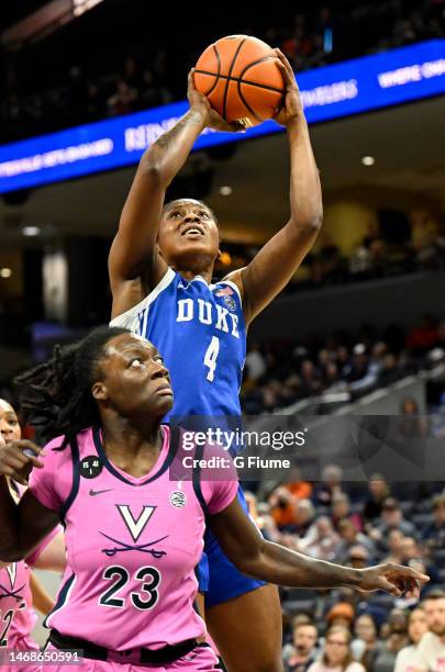 Elizabeth Balogun of the Duke Blue Devils shoots the ball against Alexia Smith of the Virginia Cavaliers at John Paul Jones Arena on February 19,...