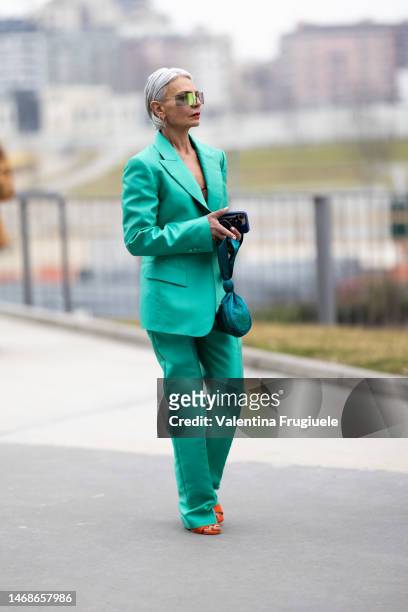 Grace Ghanem is seen wearing a satin mint green pant suit outside the Alberta Ferretti show during the Milan Fashion Week Womenswear Fall/Winter...