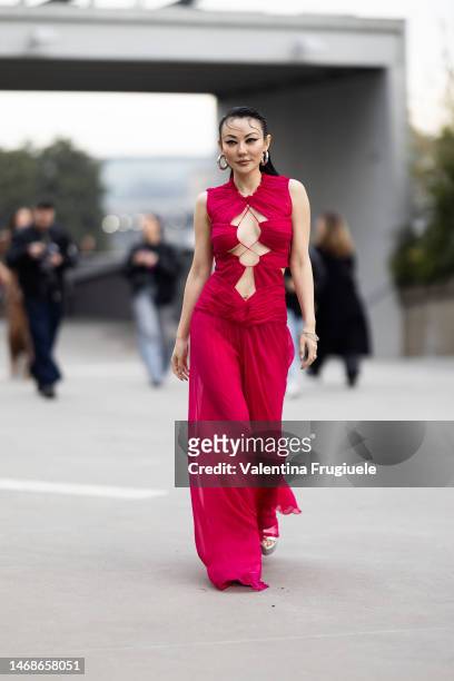 Jessica Wang is seen wearing a pleated chiffon long dress with a middle slit outside the Alberta Ferretti show during the Milan Fashion Week...