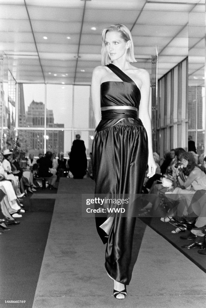 Model Diane Dewitt walks the runway show in a silk satin evening ...