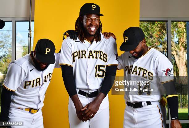 Carlos Santana, Oneil Cruz, and Rodolfo Castro of the Pittsburgh Pirates poses for a portrait during the 2023 Pittsburgh Pirates Photo Day at Pirate...