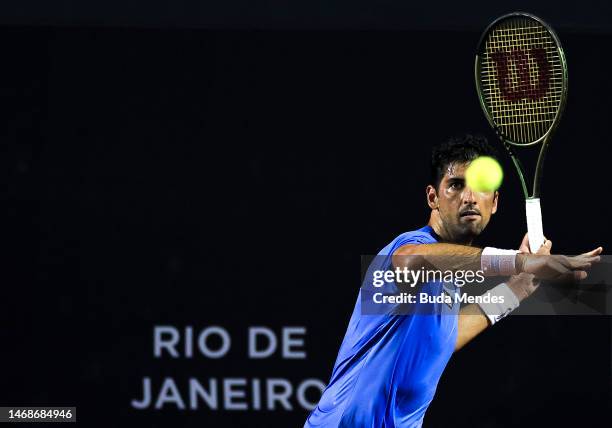 Thomaz Bellucci of Brazil returns a shot to Sebastian Baez of Argentina during day three of ATP 500 Rio Open presented by Claro at Jockey Club...