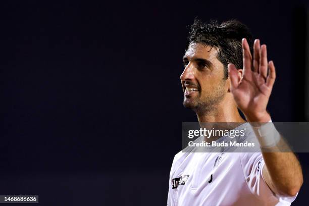 Thomaz Bellucci of Brazil receives a tribute for his retirement from tennis during a match against Sebastian Baez of Argentina during day three of...