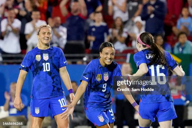 Mallory Swanson of the United States celebrates with Rose Lavelle and Lindsey Horan after scoring a goal against Brazil during the second half in the...