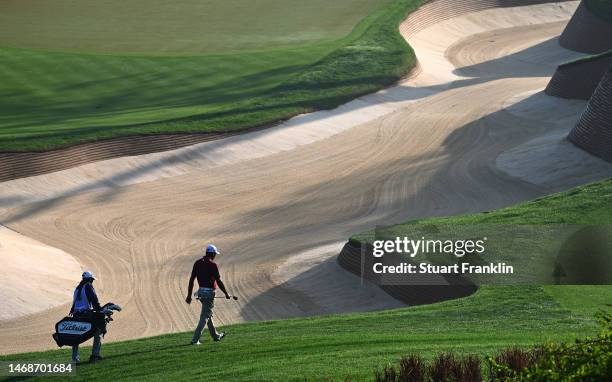 General view as Gaganjeet Bhullar of India walks to the green on the 12th hole during Day One of the Hero Indian Open at Dlf Golf and Country Club on...