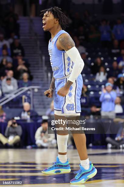 Caleb Love of the North Carolina Tar Heels celebrates a three pointer against the Notre Dame Fighting Irish during the second half at Purcell...