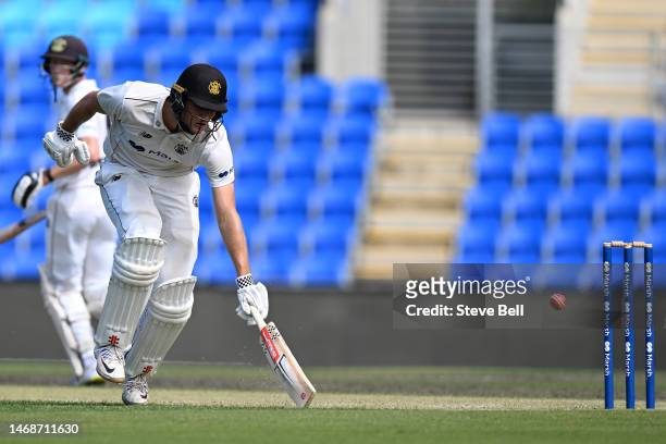Aaron Hardie of Western Australia narrowly avoids being runout during the Sheffield Shield match between Tasmania and Western Australia at Blundstone...