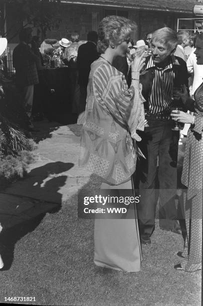 Catherine Hawn , Aaron Spelling , and Candy Spelling attend a fundraiser for the Concern Foundaition in the Bel-Air neighborhood of Los Angeles,...