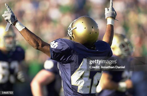 Cornerback Shane Walton of the Notre Dame Fighting Irish celebrates a big play during the NCAA football game against the Stanford Cardinal on October...