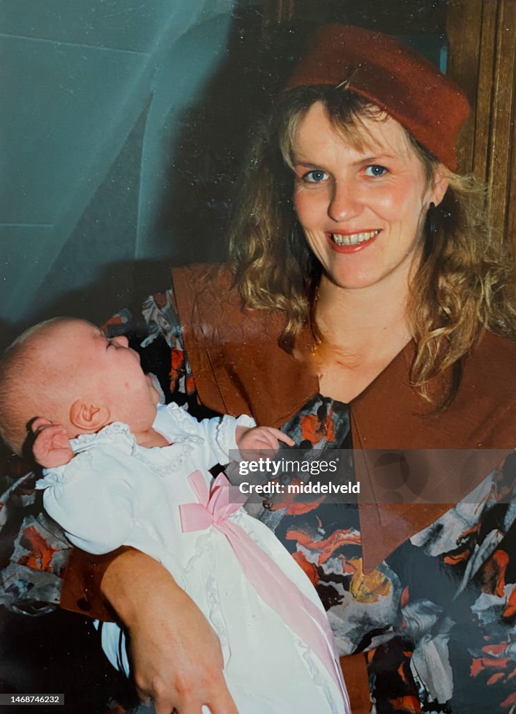 Mother with baby in the eighties