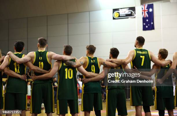 The Boomers embrace for the national anthem during the FIBA World Cup Qualification match between the Australia Boomers and Bahrain at State...