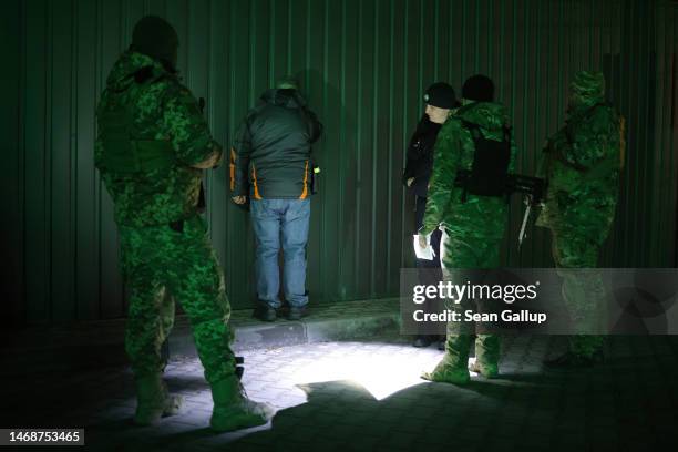 Yaroslav Kryvulya , a reserve officer in the Ukrainian army who leads a local paramilitary civil formation called TSEL, and colleagues and a police...