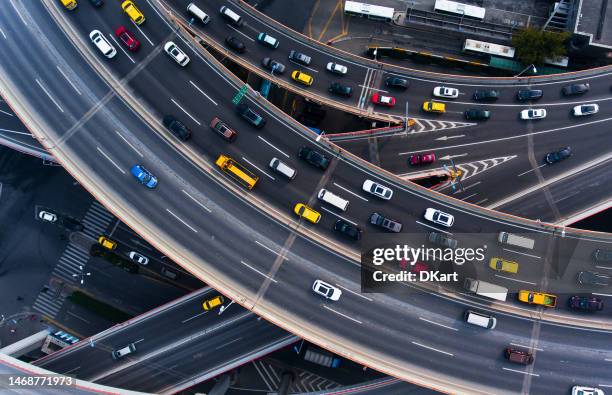 traffic on highway in shanghai - motor racing track aerial stock pictures, royalty-free photos & images