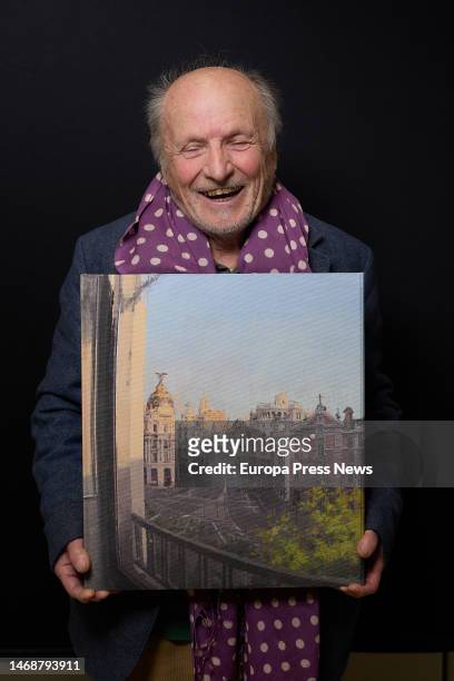 The painter Antonio Lopez poses for Europa Press with one of his paintings, at the Feria de Madrid IFEMA, on 23 February, 2023 in Madrid, Spain....
