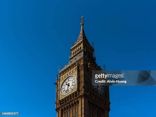 view of london big ben (great bell of the great clock of westminster) in london, england . - belfort stock pictures, royalty-free photos & images