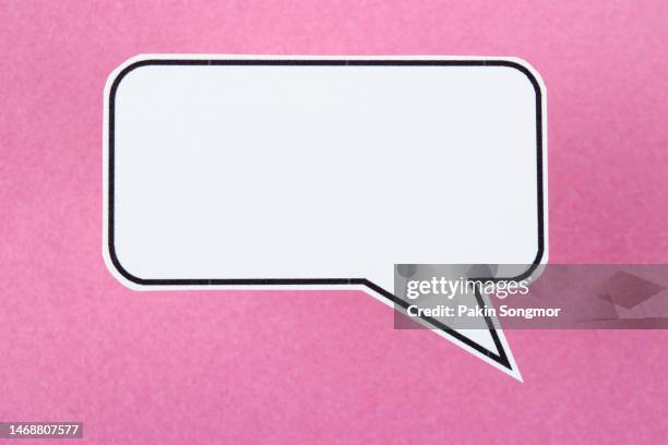 the words talking and speaking are conveyed by a speech bubble with copy space on a pink background. - speech bubbles stock pictures, royalty-free photos & images