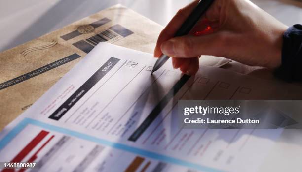 ballot paper woman - voting ballot stock pictures, royalty-free photos & images